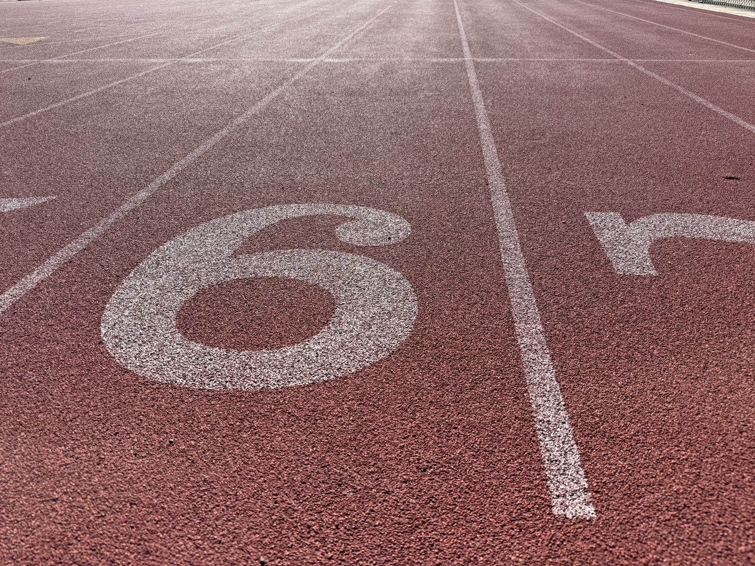 Lane 6 number on a red track