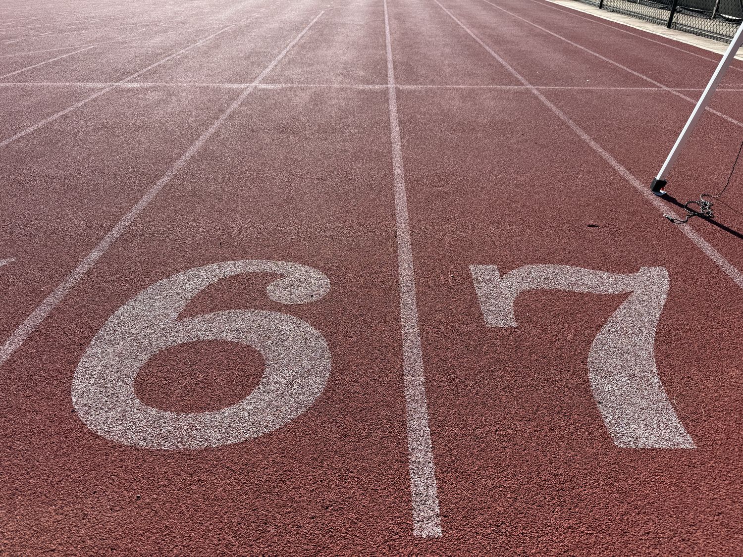 Lane numbers 6 and 7 on the track