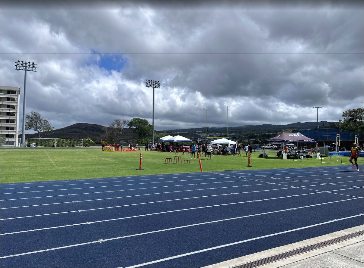 Blue track with dramatic clouds in Hawaii