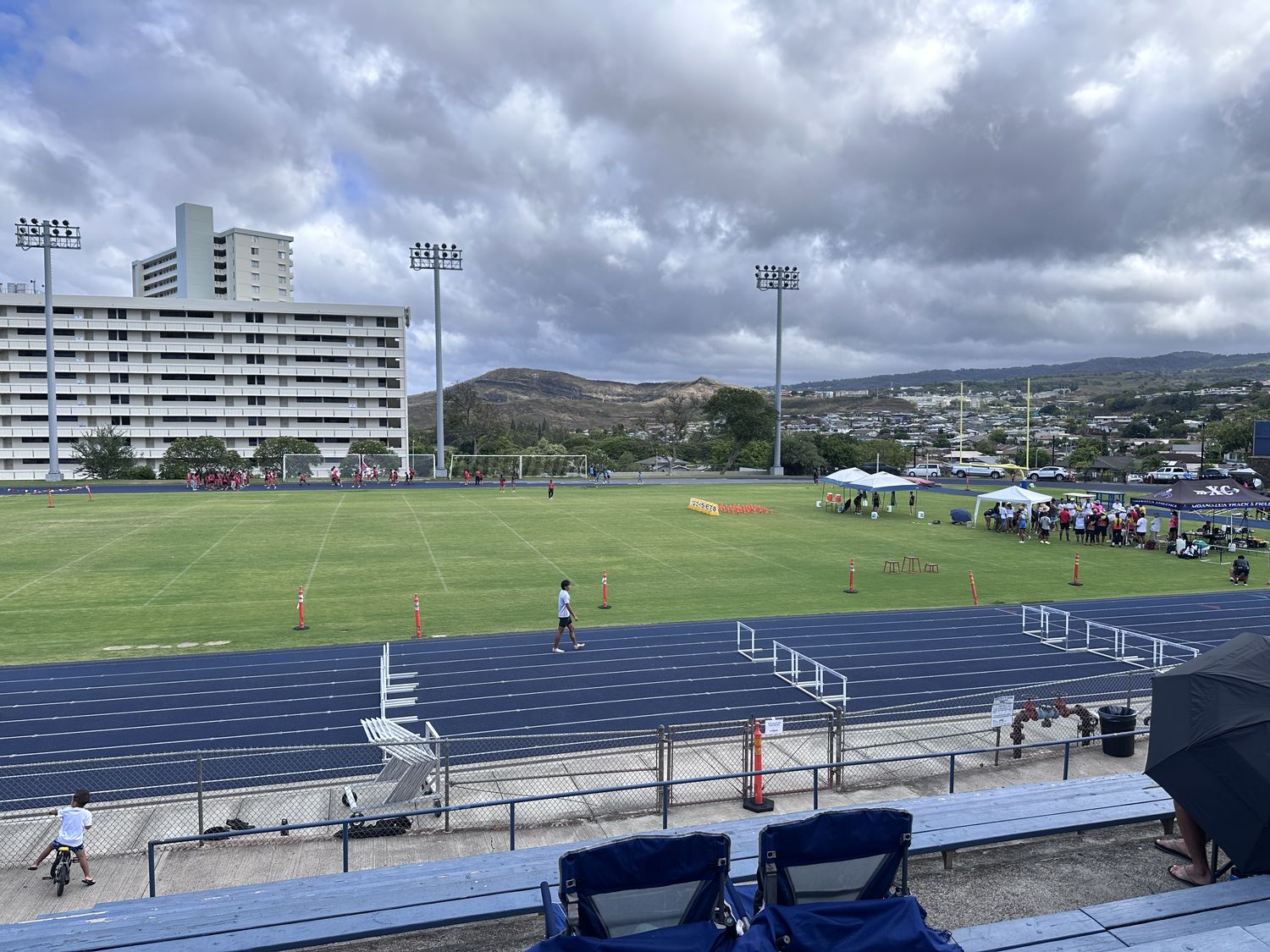 Blue track from the bleachers on a cloudy day
