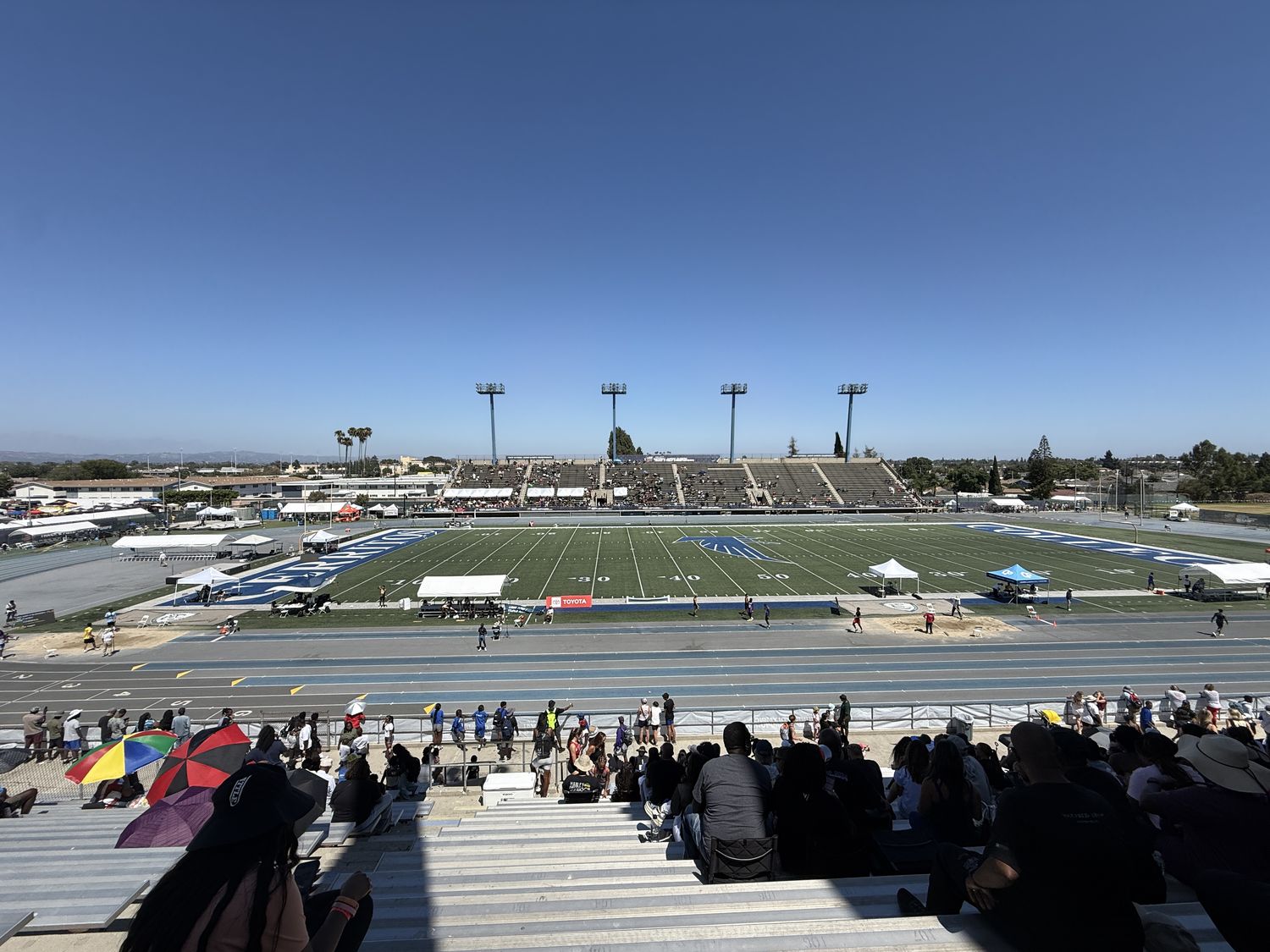 Wide view of Cerritos College stadium during the 2026 USATF National Junior Olympic Track and Field Championships