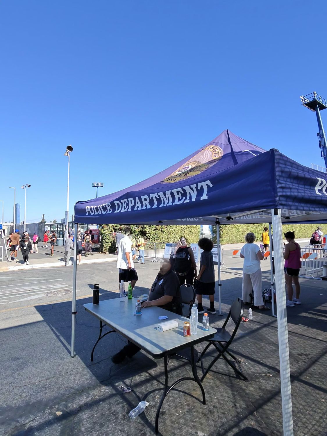 Police Department tent and security checkpoint at the entrance to the USATF Junior Olympics at Cerritos College